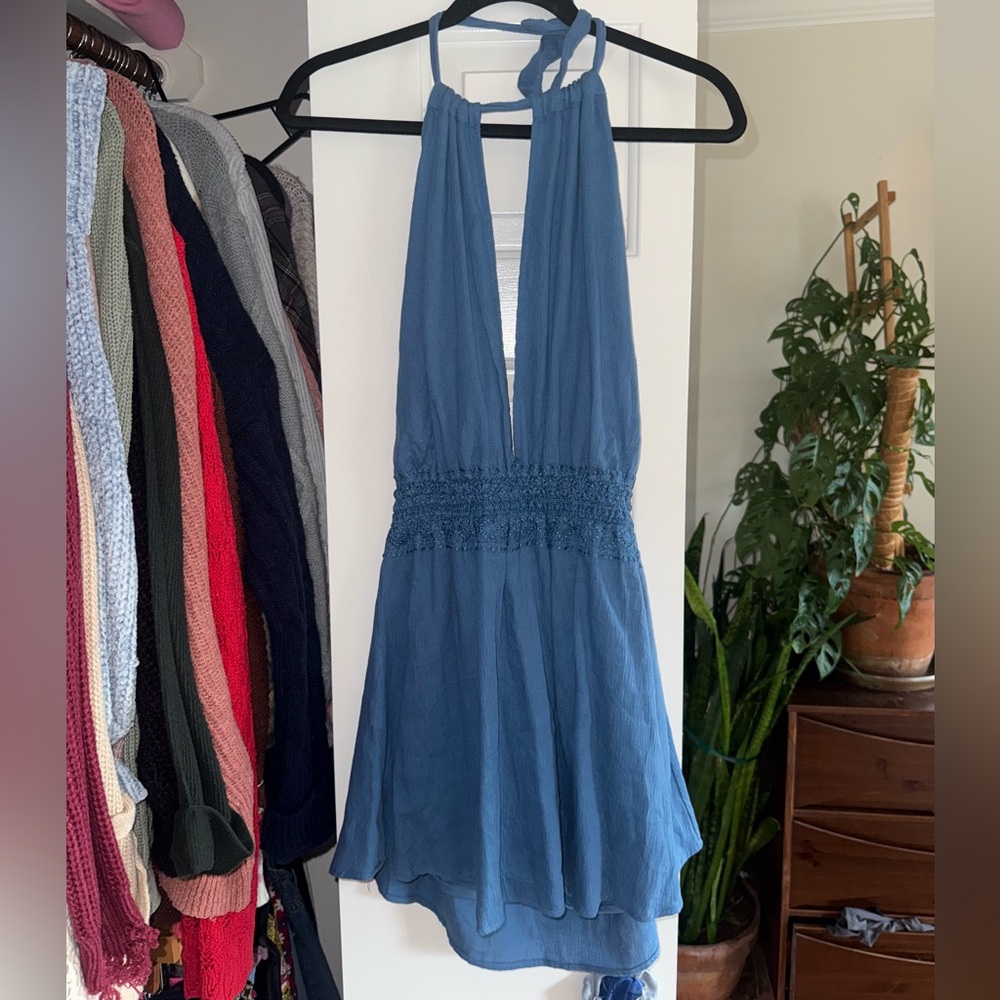 Blue backless dress with shorts underneath